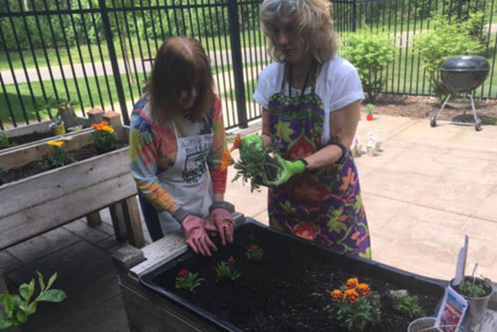 Gardening at Deephaven Woods in Deephaven, MN