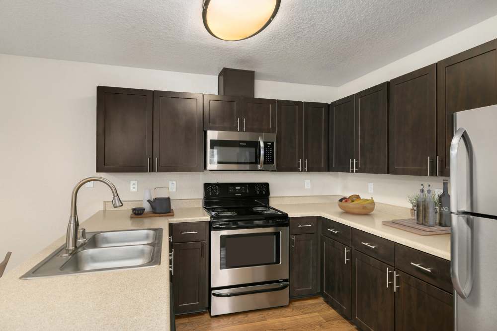 Bright kitchen at Carriage Park Apartments in Vancouver, Washington