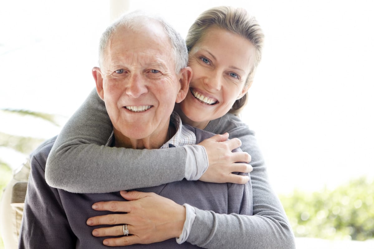 A family member visiting a relative at Estancia Senior Living in Fallbrook, California