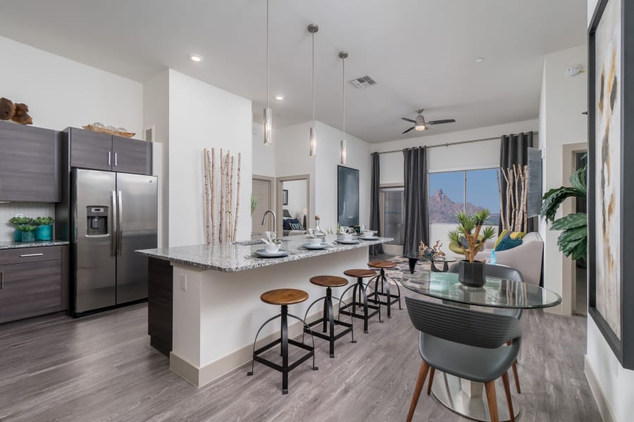 Upgraded kitchen with granite counter tops at The District at Scottsdale in Scottsdale, Arizona