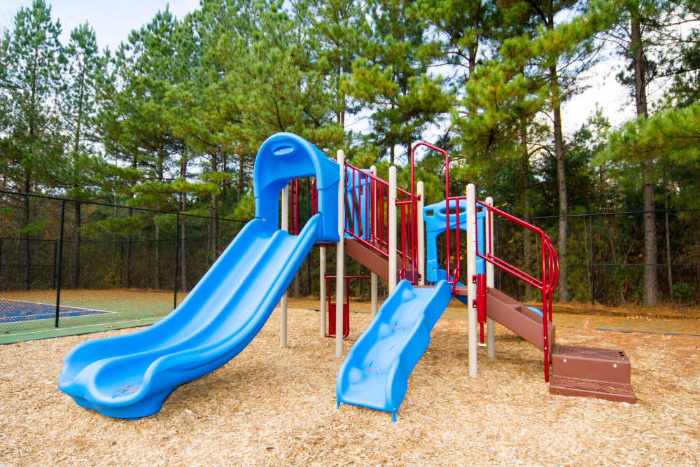 Playground with blue slides at Dakota Mill Creek in Buford,Georgia