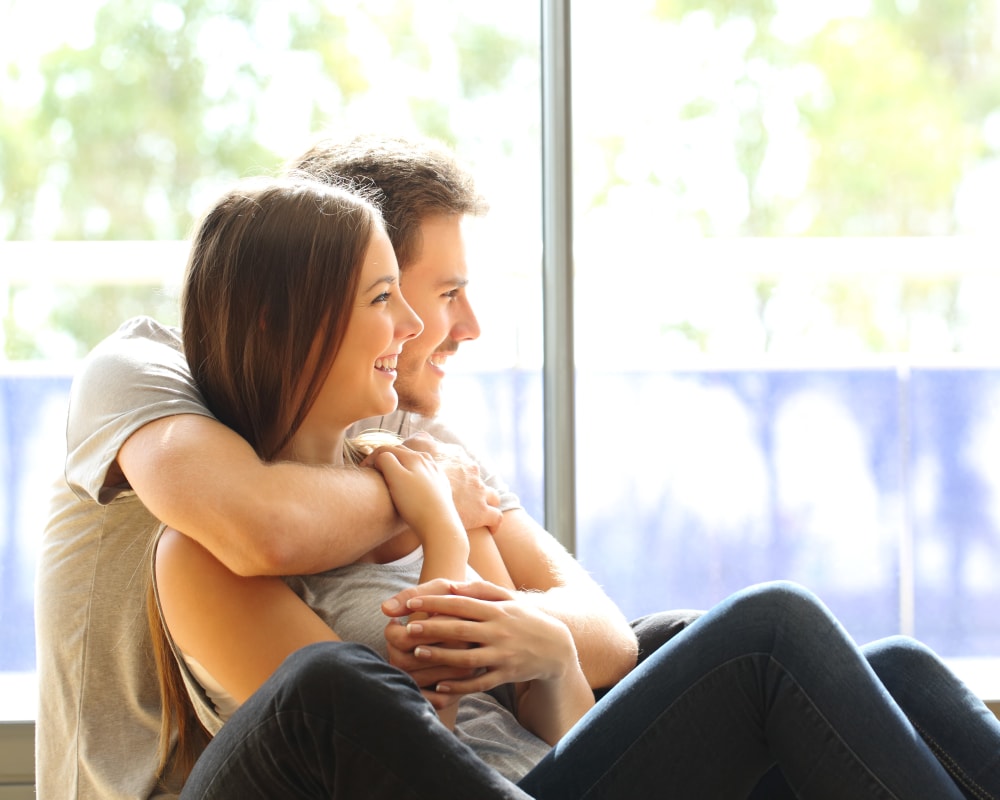 Couple relaxing at home at The Emery at Terra Nova in Chula Vista, California