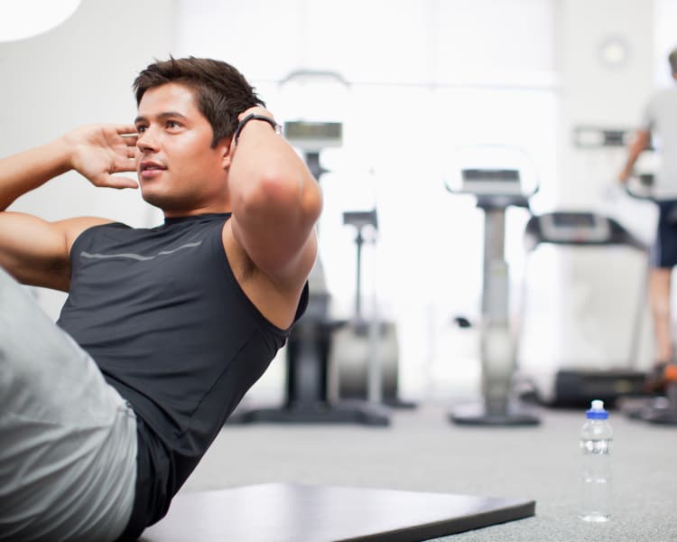 Man exercising at fitness center near Sedona Canyon