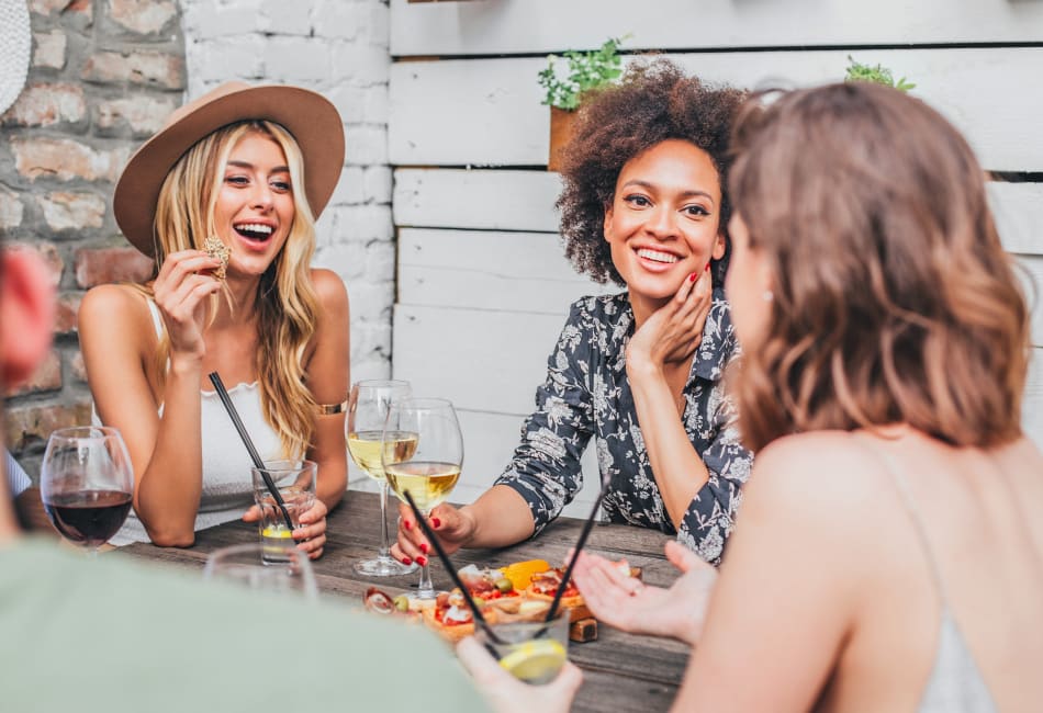 Residents catching up over a glass of wine near Vue Issaquah in Issaquah, Washington