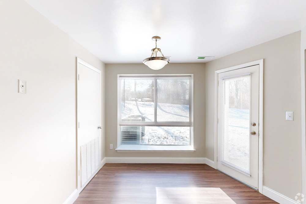 Living room with ceiling fan at Knights Bridge II in Burtonsville Maryland