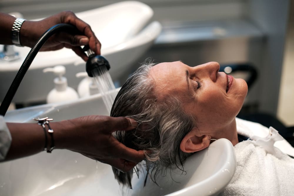 Woman having her hair washed at The Pinnacle in Plymouth Meeting, Pennsylvania