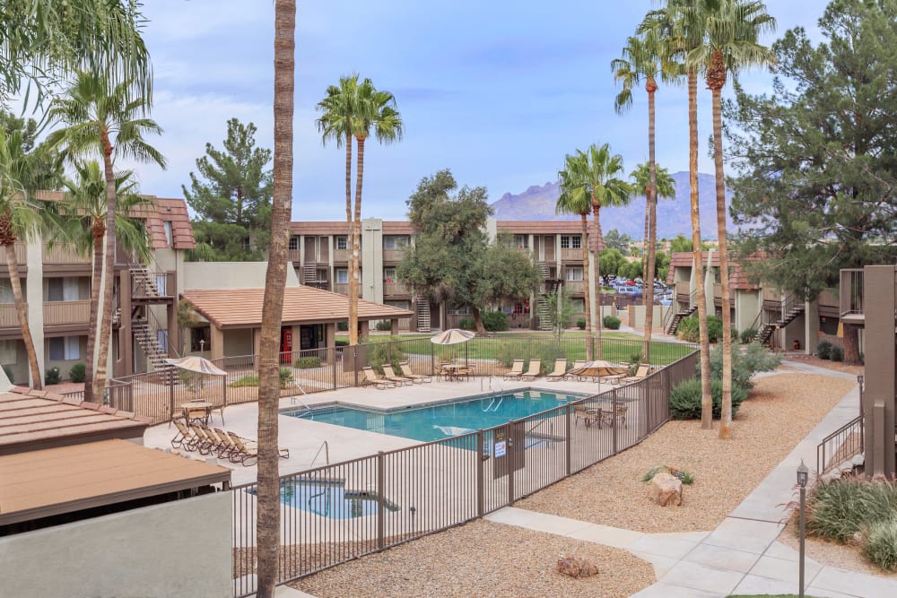 View of the pool area and neighborhood at Verde Apartments in Tucson, Arizona