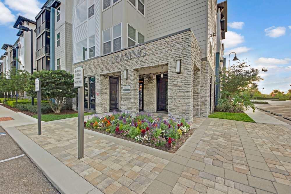 Exterior of leasing office at The Courtney at Lake Shadow in Orlando, Florida