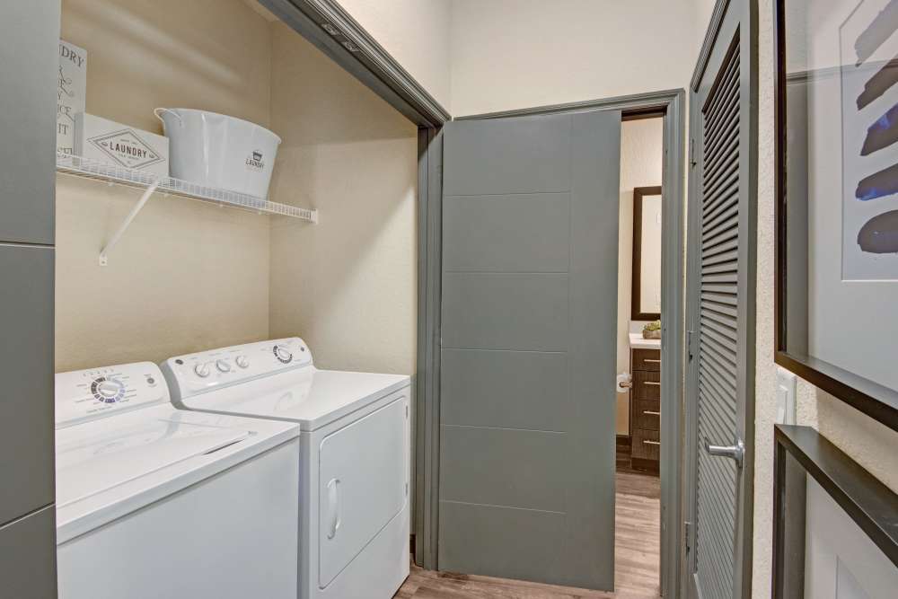 In-home washer and dryer at The Courtney at Lake Shadow in Orlando, Florida