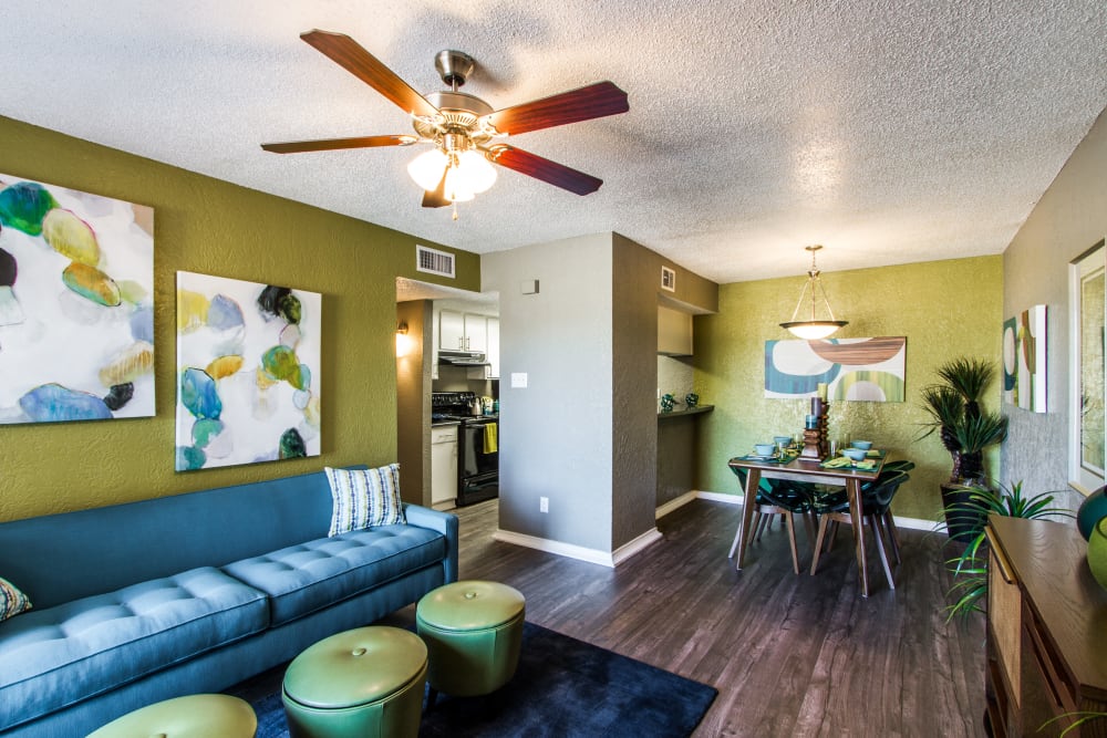 Model living room and dining area at Sundance Apartments in College Station, Texas