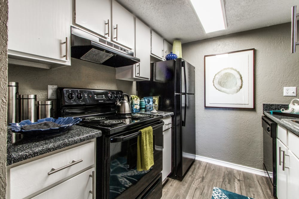 Fully equipped model kitchen at Sundance Apartments in College Station, Texas