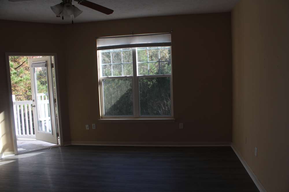 Living room with windows at Lexington Park in Ocean Springs,Mississippi