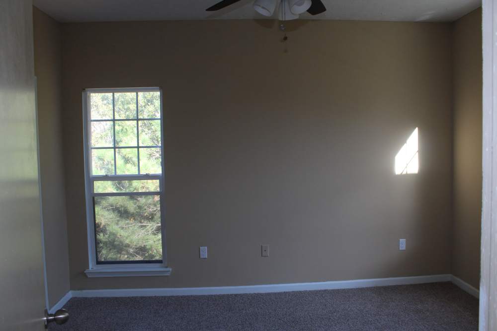 Bedroom with windows at Lexington Park in Ocean Springs,Mississippi