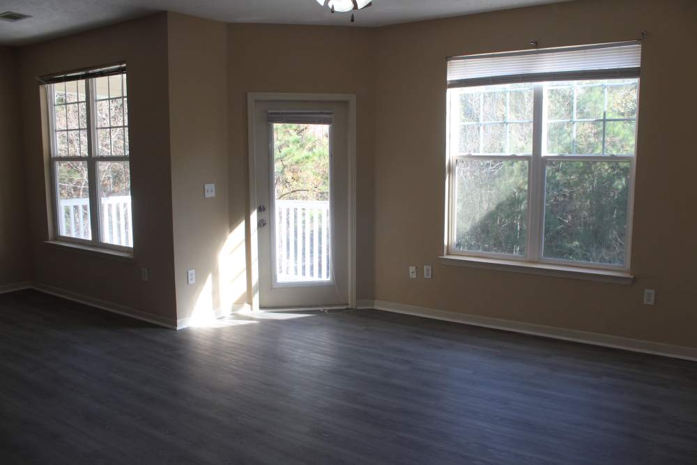 Living room with wooden floor at Lexington Park in Ocean Springs,Mississippi