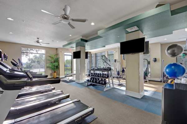 Fitness center at The Courtney at Lake Shadow in Orlando, Florida