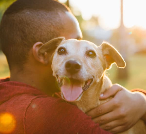 Resident with his dog at Parkside Apartments