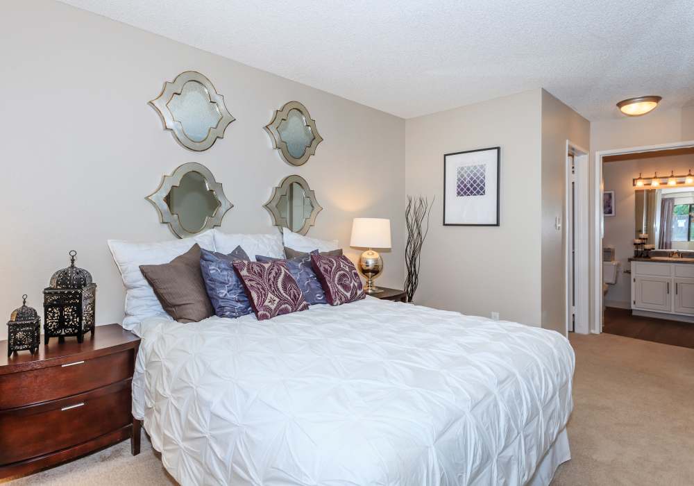 Bright bedroom at Parcwood Apartments in Corona, California, 