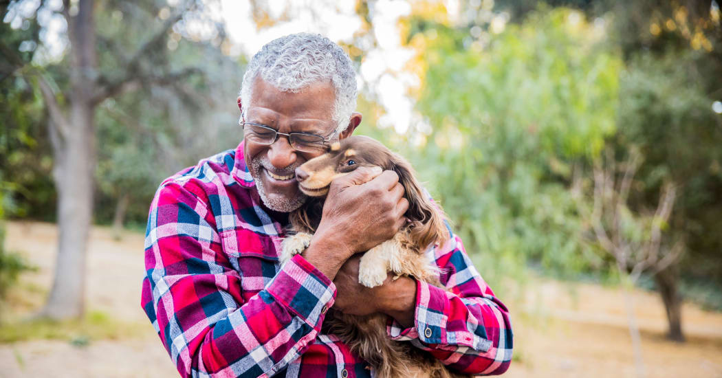 Resident and his dog loving their new neighborhood at Trails at Buda Ranch in Buda, Texas