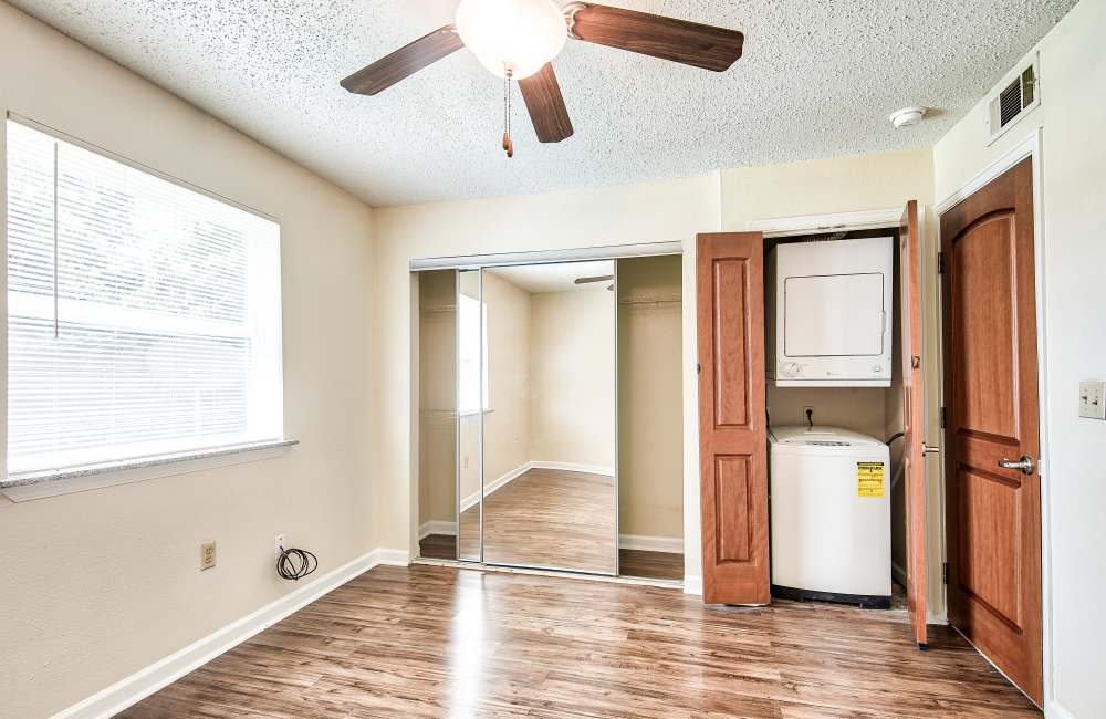 Bedroom with walk-in closet at Villas at Emerald Park in Gretna, Louisiana