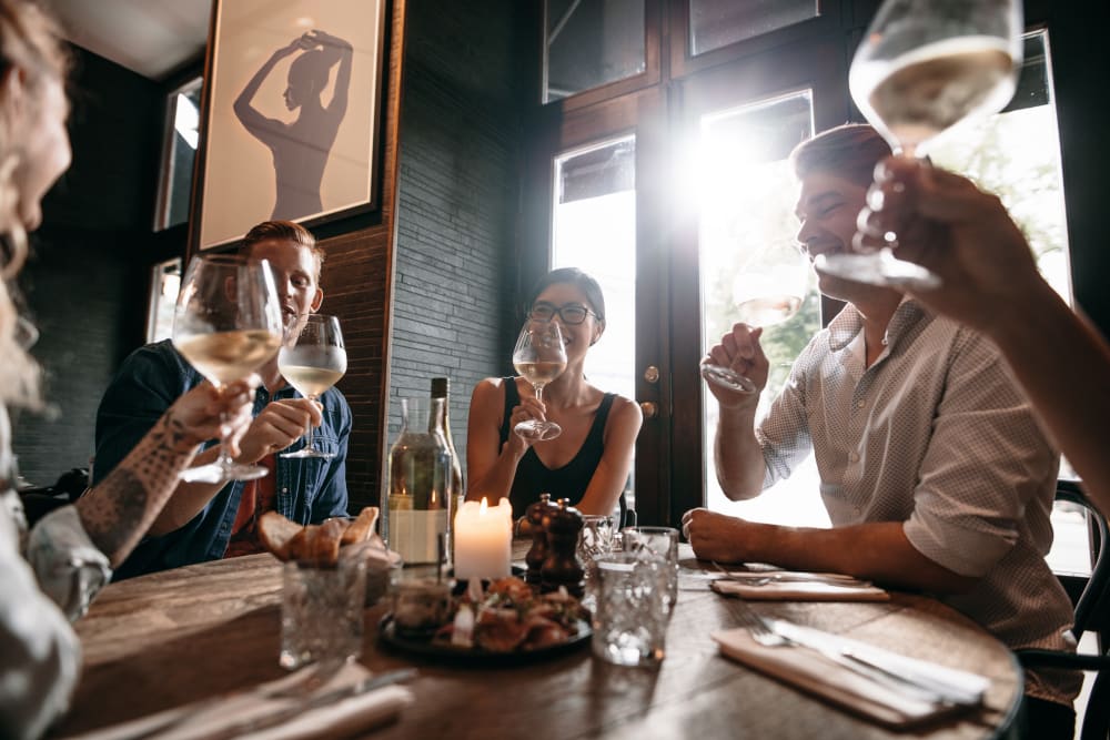 Residents enjoying a meal together near Avery Park Apartments in Fairfield, California