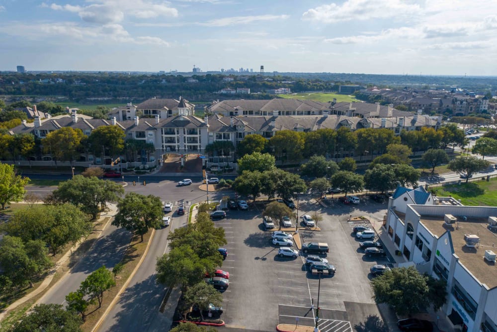 Parking lot and community buildings at Meridian Apartments in San Antonio, Texas