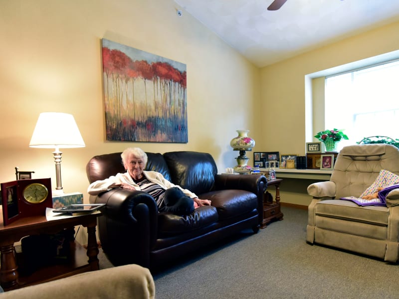 A resident enjoying her apartment at Garden Place Millstadt in Millstadt, Illinois