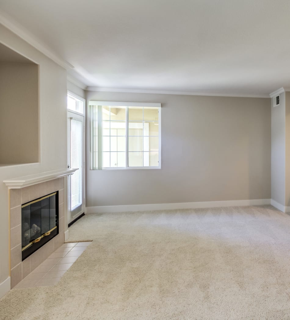 Plush carpeting and an in-unit washer and dryer in a model home at Sofi Westview in San Diego, California