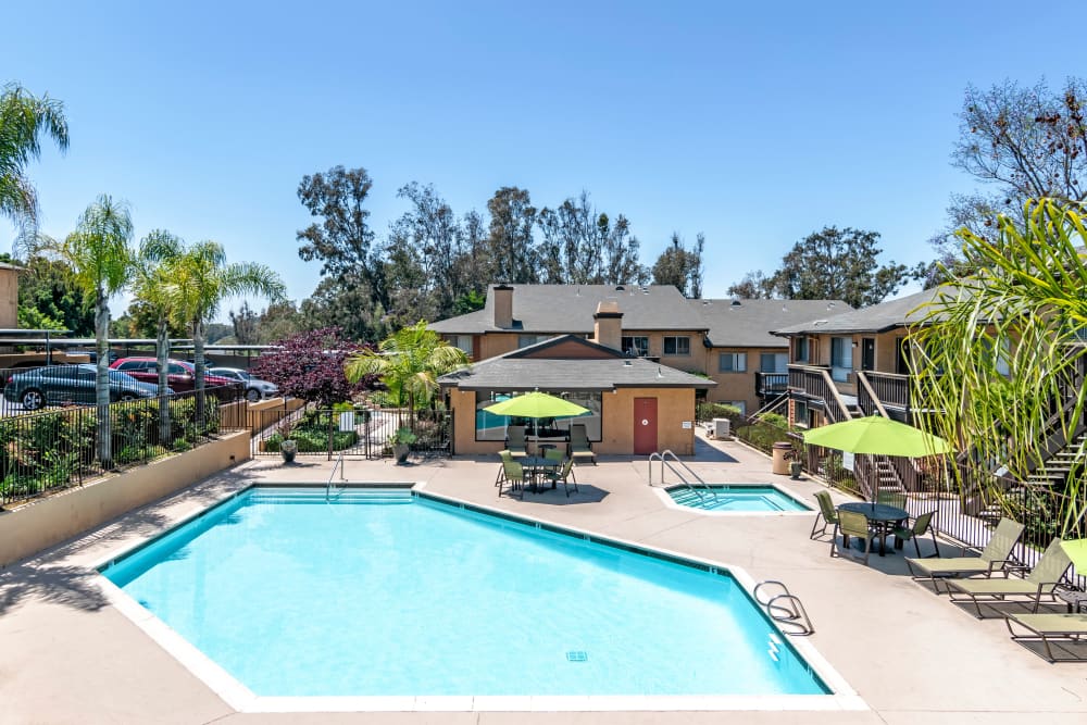 Hot tub and swimming pool at Hillside Terrace Apartments in Lemon Grove, California