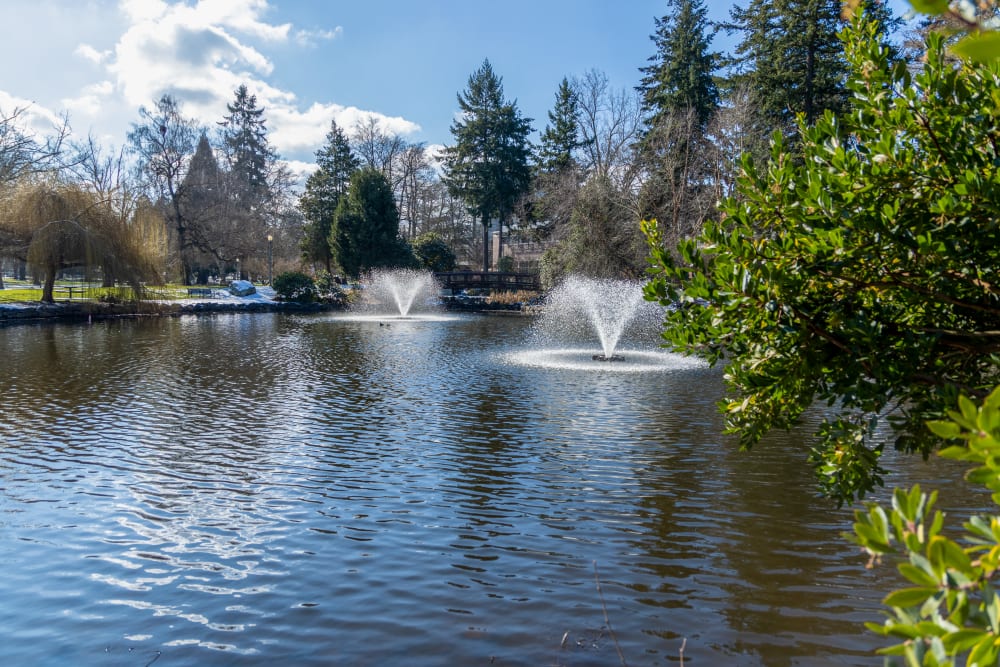 Park and fountain views of Merrill Gardens at Wright Park in Tacoma, Washington