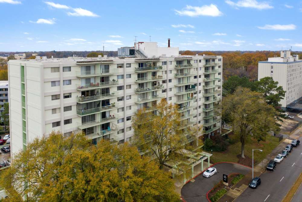 Aerial view of the charming apartment with inviting balconies and well-maintained exterior at Central Gardens in Memphis, Tennessee