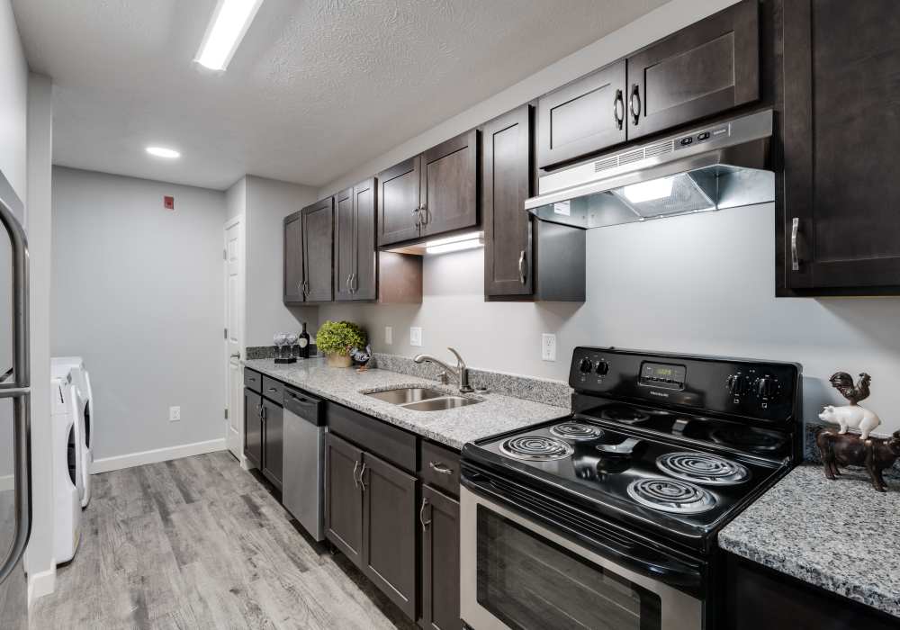 Kitchen with modern appliances at Spring Lake Apartments in Granger, Indiana