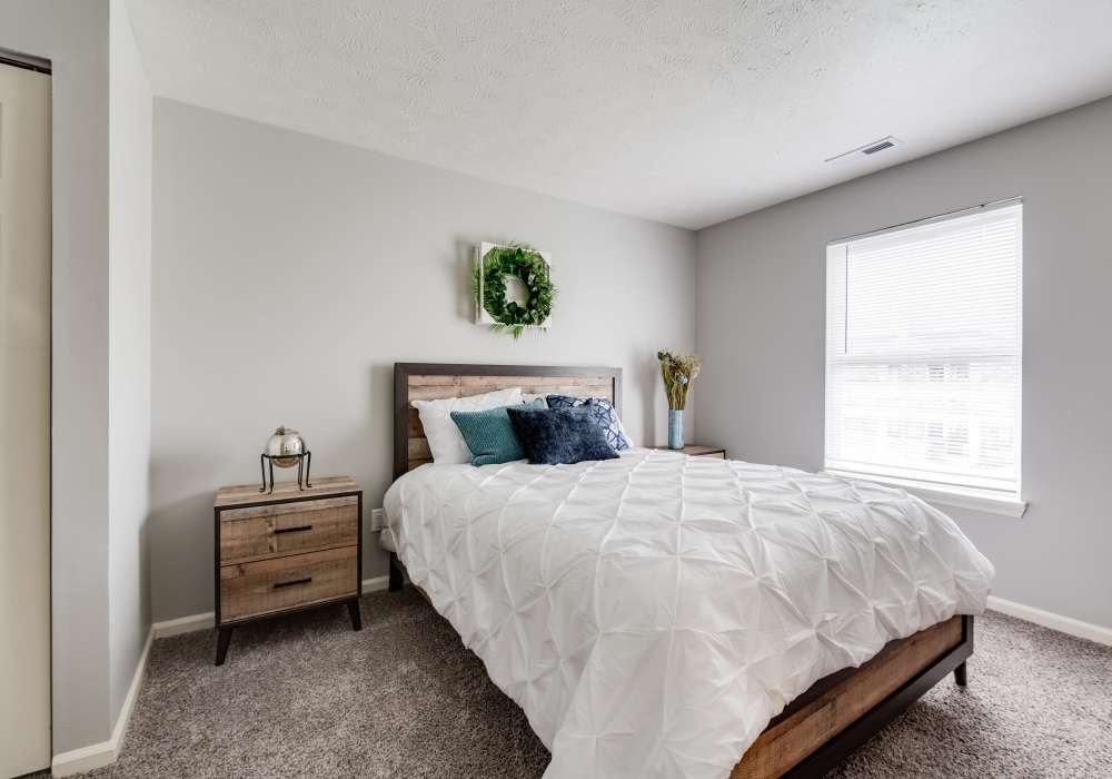 Well-lit bedroom at Spring Lake Apartments in Granger, Indiana