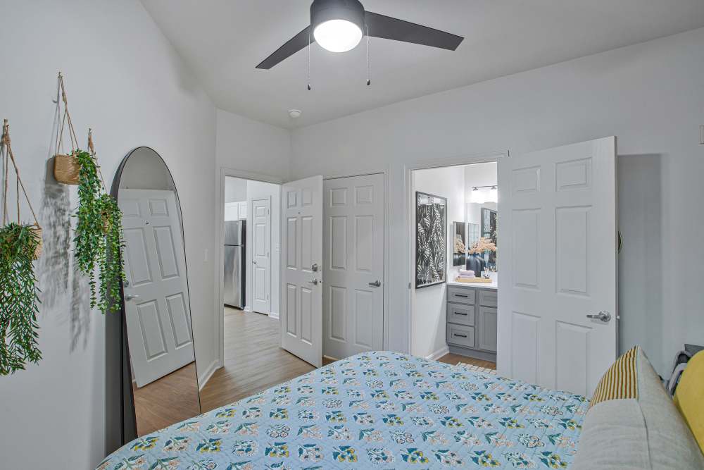 Bedroom with clean bed sheet at Terra in College Park, Maryland