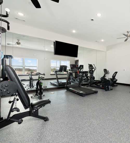 Community gym at The Janson in Del Valle, Texas