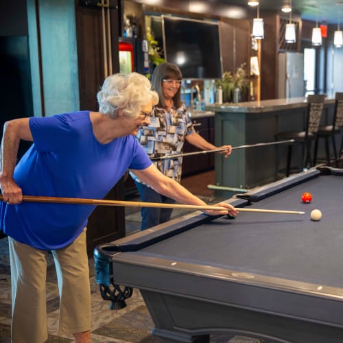 Residents playing pool at Attivo Trail in Waukee, Iowa
