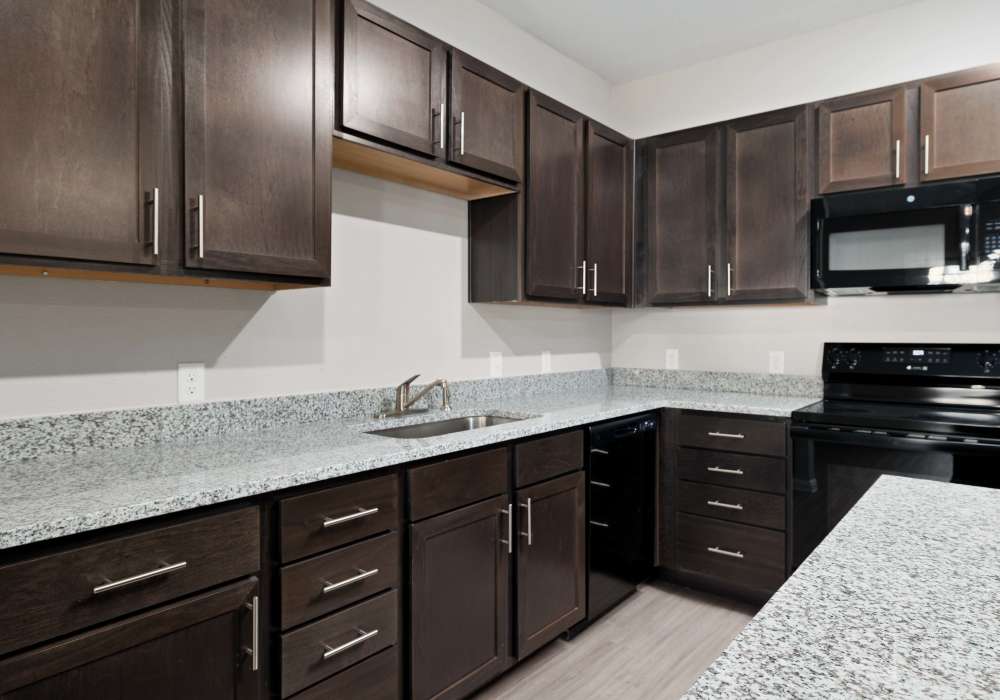 Kitchen with black colored appliances at Echo Trail in Bowling Green,Kentucky