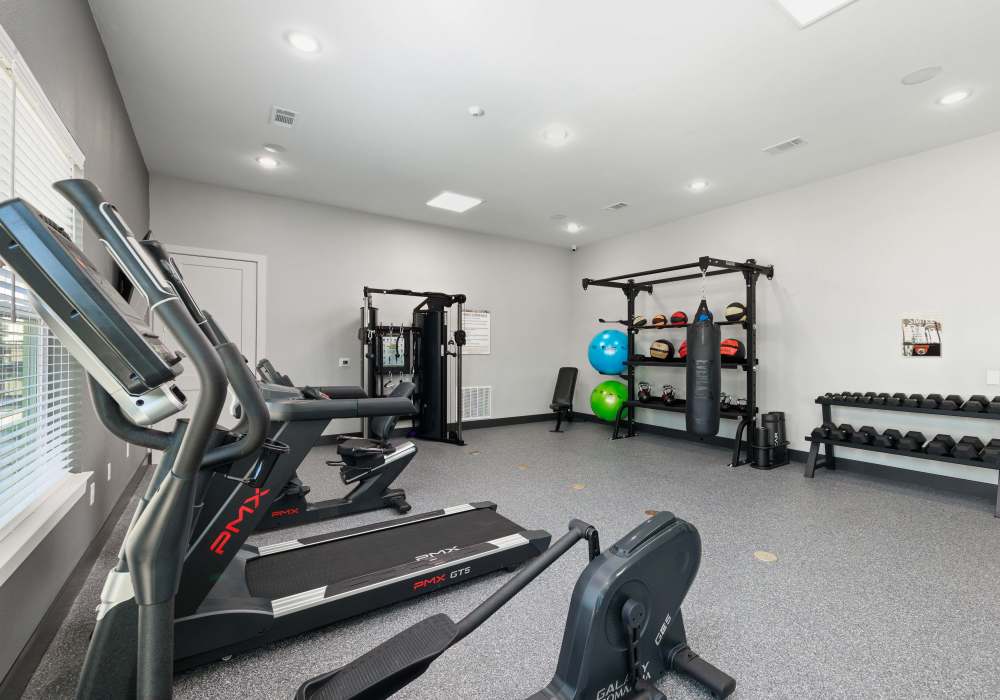 New fitness center with cardio equipment at Redwood in San Marcos, Texas