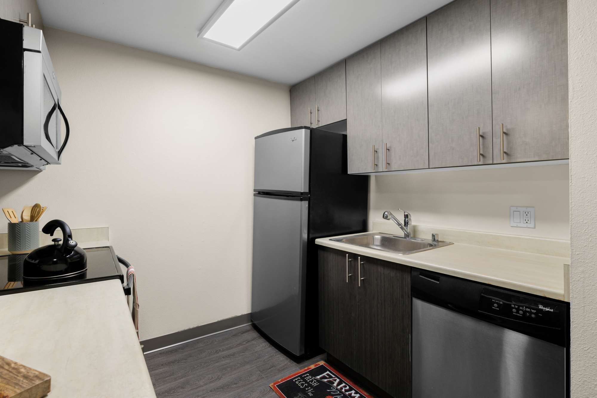 Kitchen with spacious cabinetry of Karbon Apartments in Newcastle, Washington