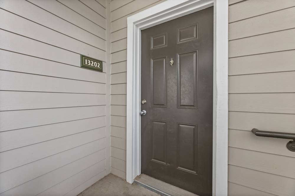 Entry door of an apartment at Costa Ibiza in Houston, Texas