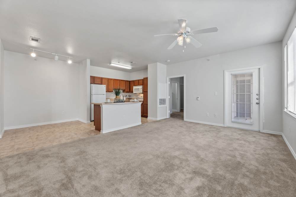 Living room with access to the kitchen at Costa Ibiza in Houston, Texas