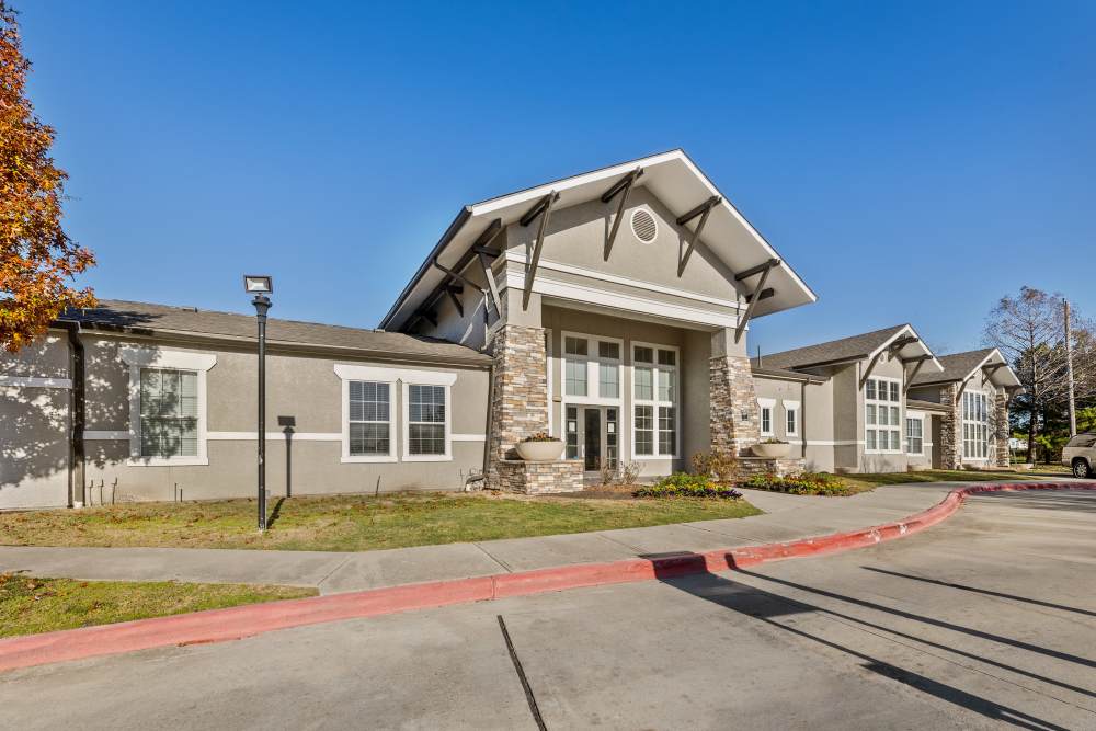  A view of the apartment building with car parking space at Costa Ibiza in Houston, Texas
