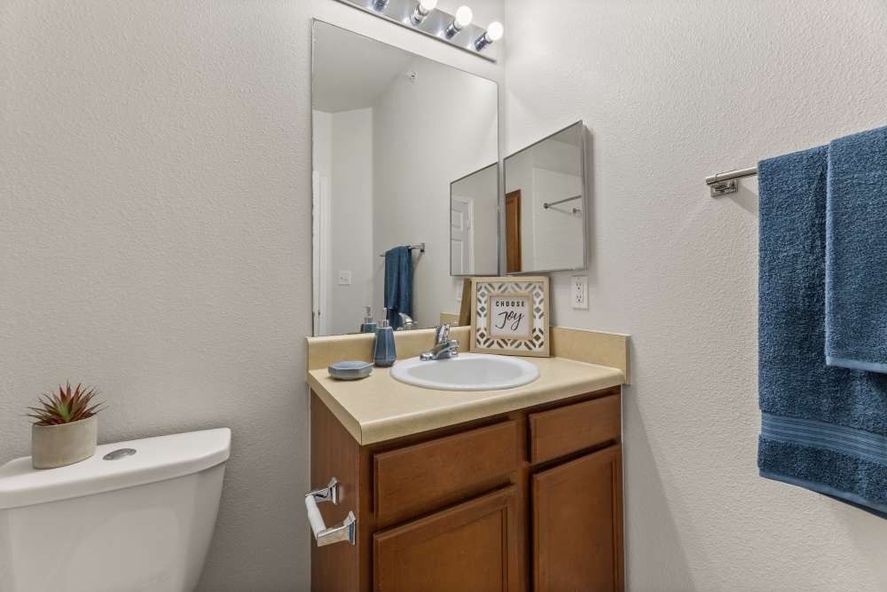 Bathroom with vanity mirror and lights  at Costa Ibiza in Houston, Texas