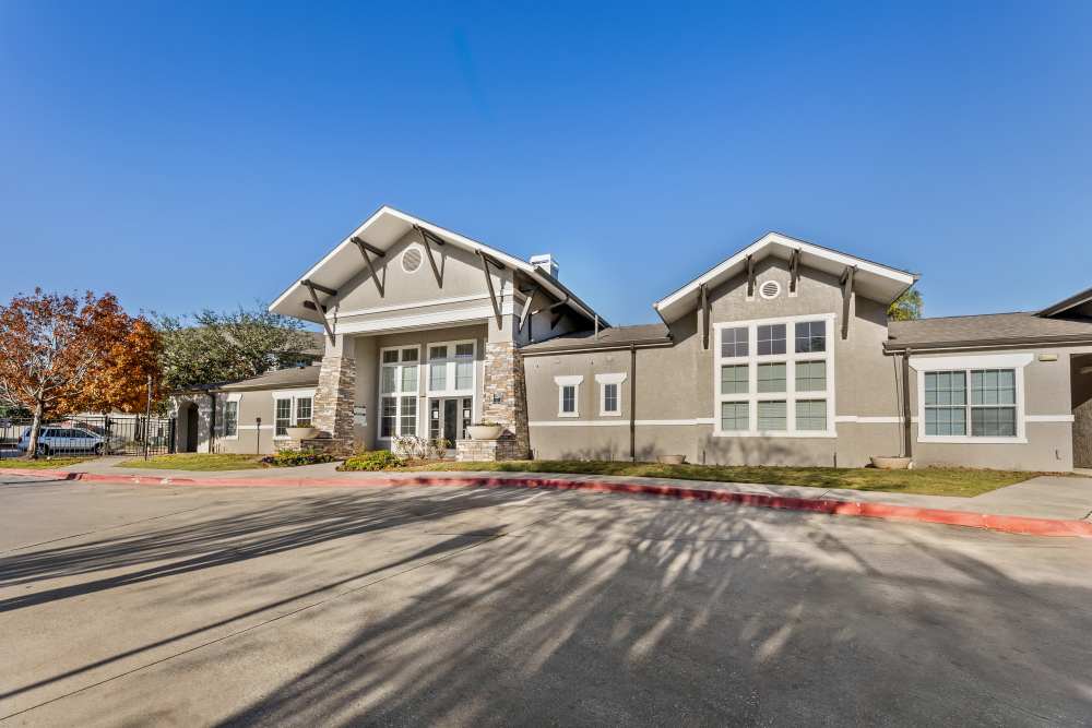 Exterior view of the apartment building with car parking space at Costa Ibiza in Houston, Texas