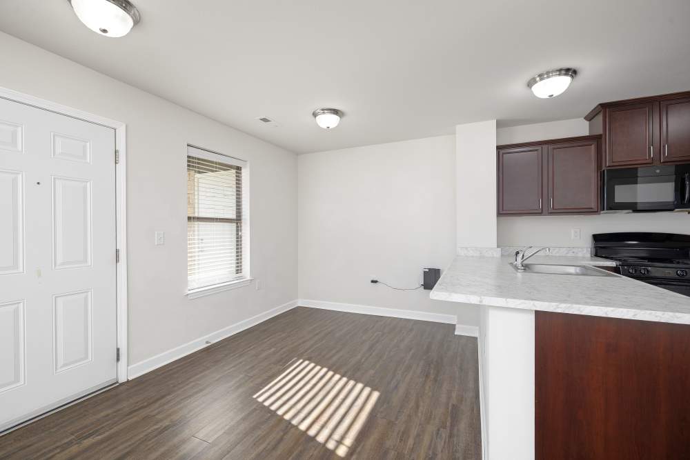 Living room and dining area at Harbor West Villas in Warsaw, Missouri