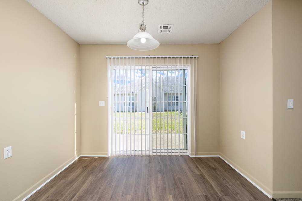 living area with wood flooring at Prairie Hill Estates in Carl Junction. MO