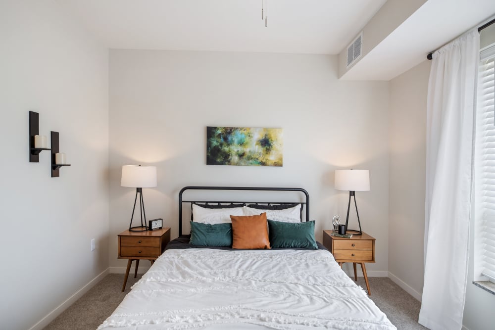 Well-lit bedroom at Arasan Apartments in Shakopee, Minnesota