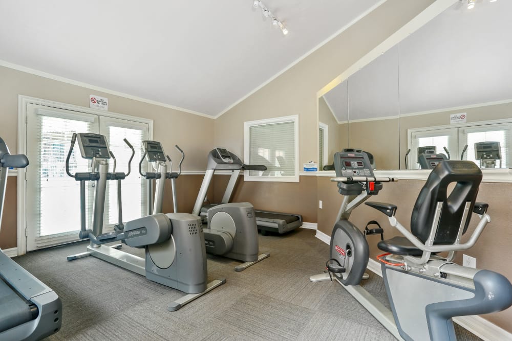Fitness center with plenty of individual workout stations at Shadow Ridge Apartments in Oceanside, California