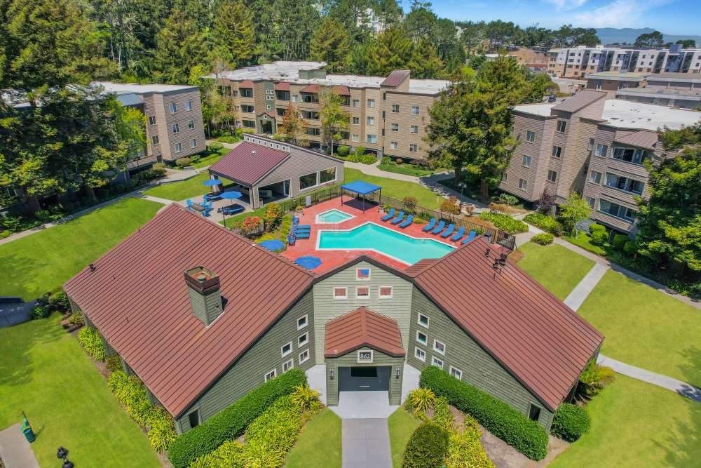 Aerial view of office and pool area at Serramonte Ridge Apartment Homes in Daly City, California