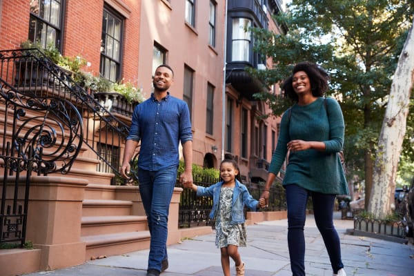 Family enjoying a walk near Winston Apartments in Baltimore, Maryland