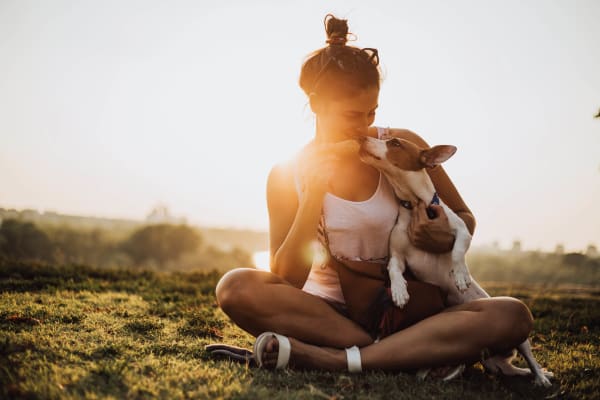 Women enjoying the sunset with dog near Flora Condominium Rentals in Walnut Creek, California